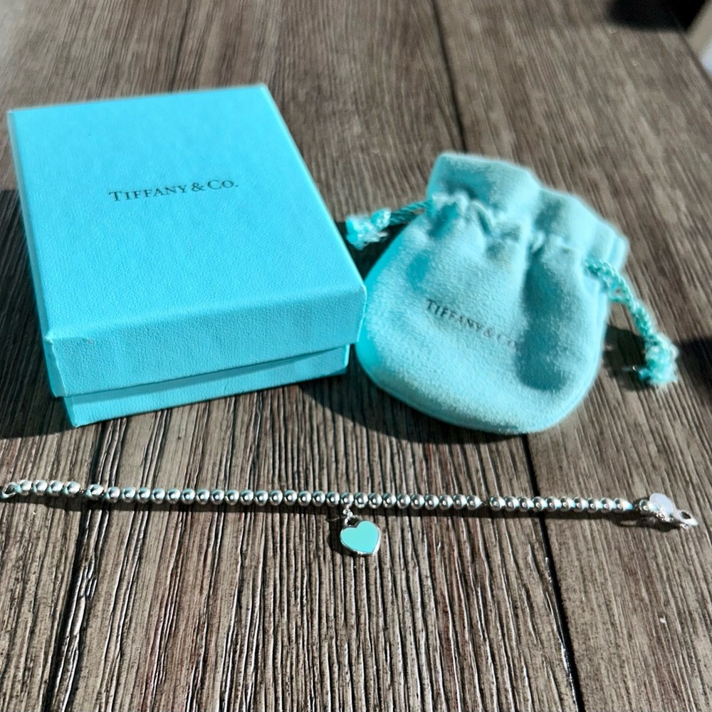 Authentic Tiffany & Co. Silver Bead Bracelet with Blue Heart Charm